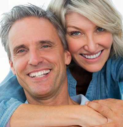 mid-age couple with best teeth