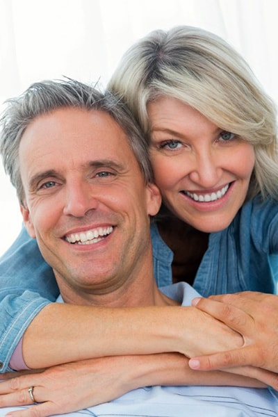 mid-age couple with best smile and white teeth