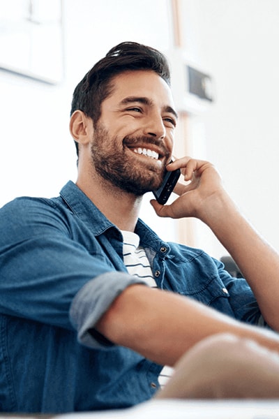 young man smiling with confidence