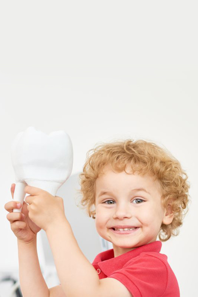 smiling kid ready for dental treatment